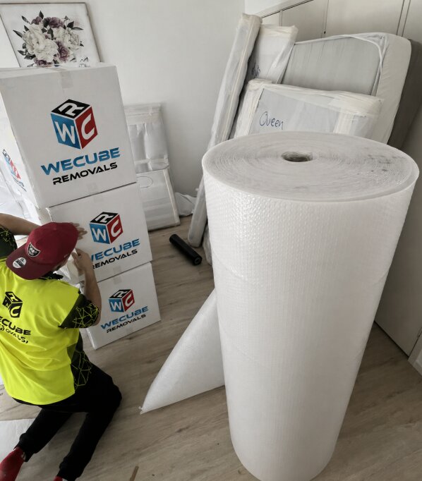 Furniture export-wrapped in WECUBE branded protective wrap
